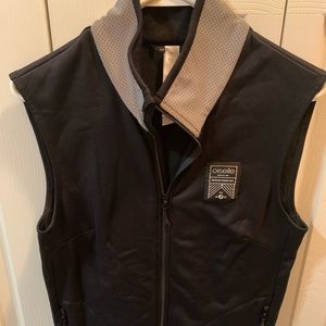 Oiselle vest with reflective collar.